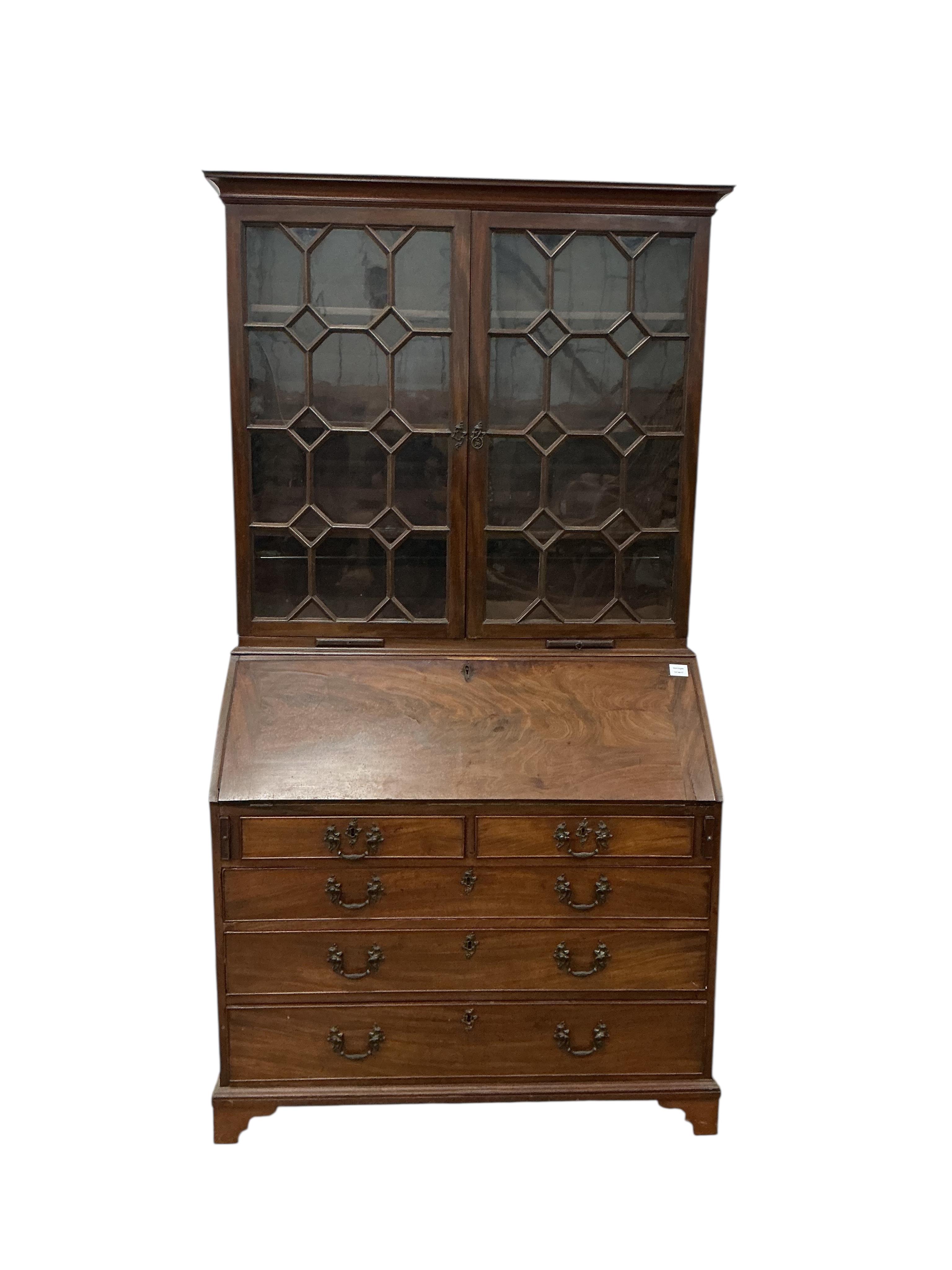 A George III and later mahogany bureau bookcase, width 106cm, depth 54cm, height 203cm